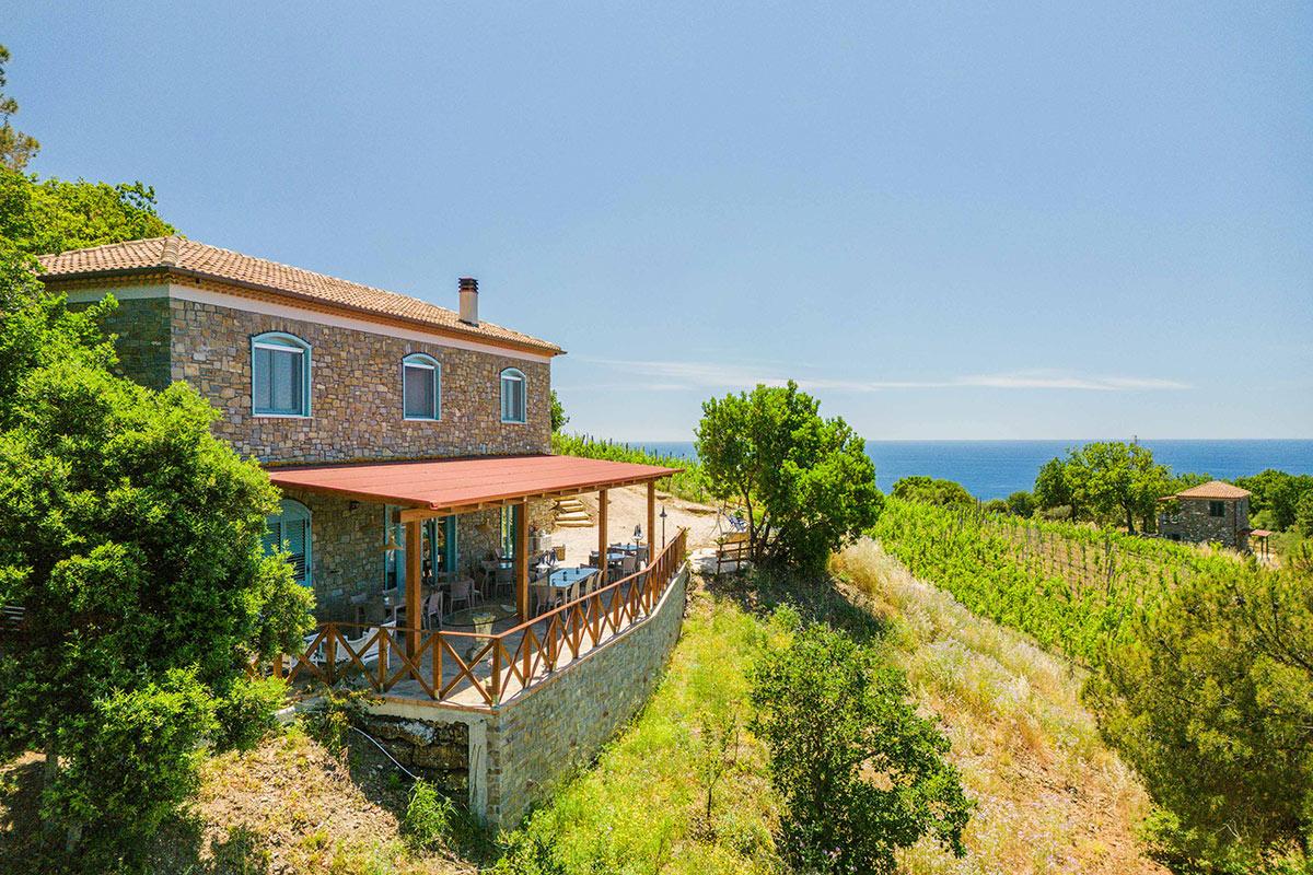 Exterior of the farmhouse with sea view.
