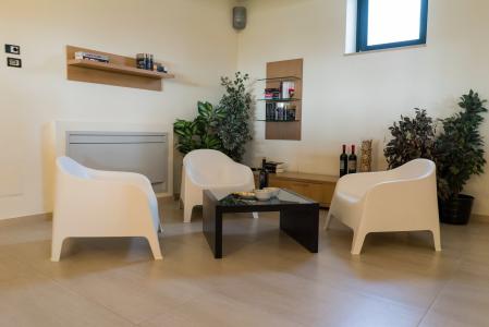 Indoor relaxation area with a small table and chairs.