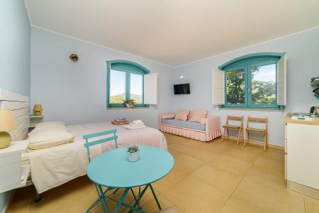 Bright and colorful furnishings in the Anchise Room.